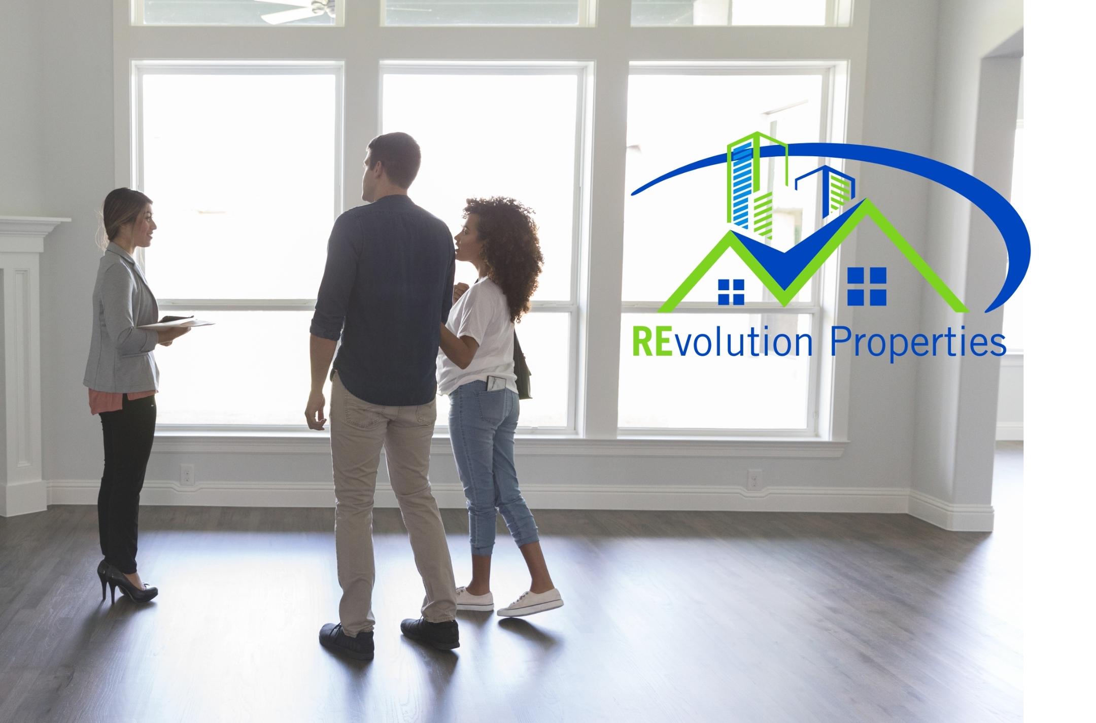 Professional property management team reviewing Connecticut rental properties