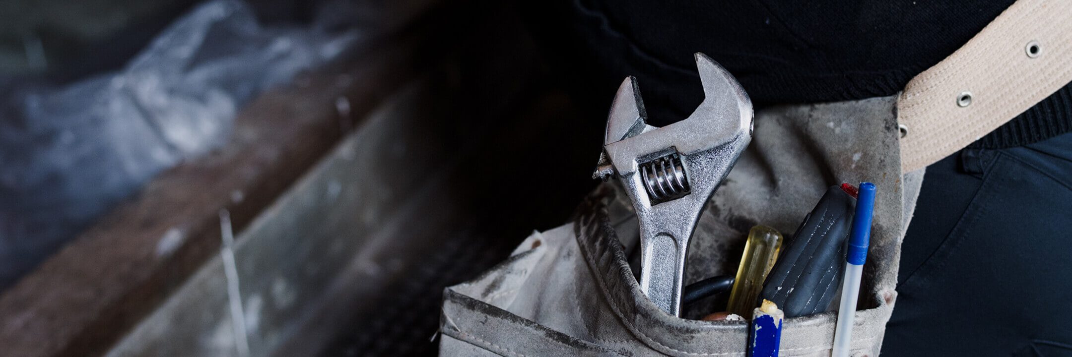 Maintenance technician performing repairs at Connecticut rental property